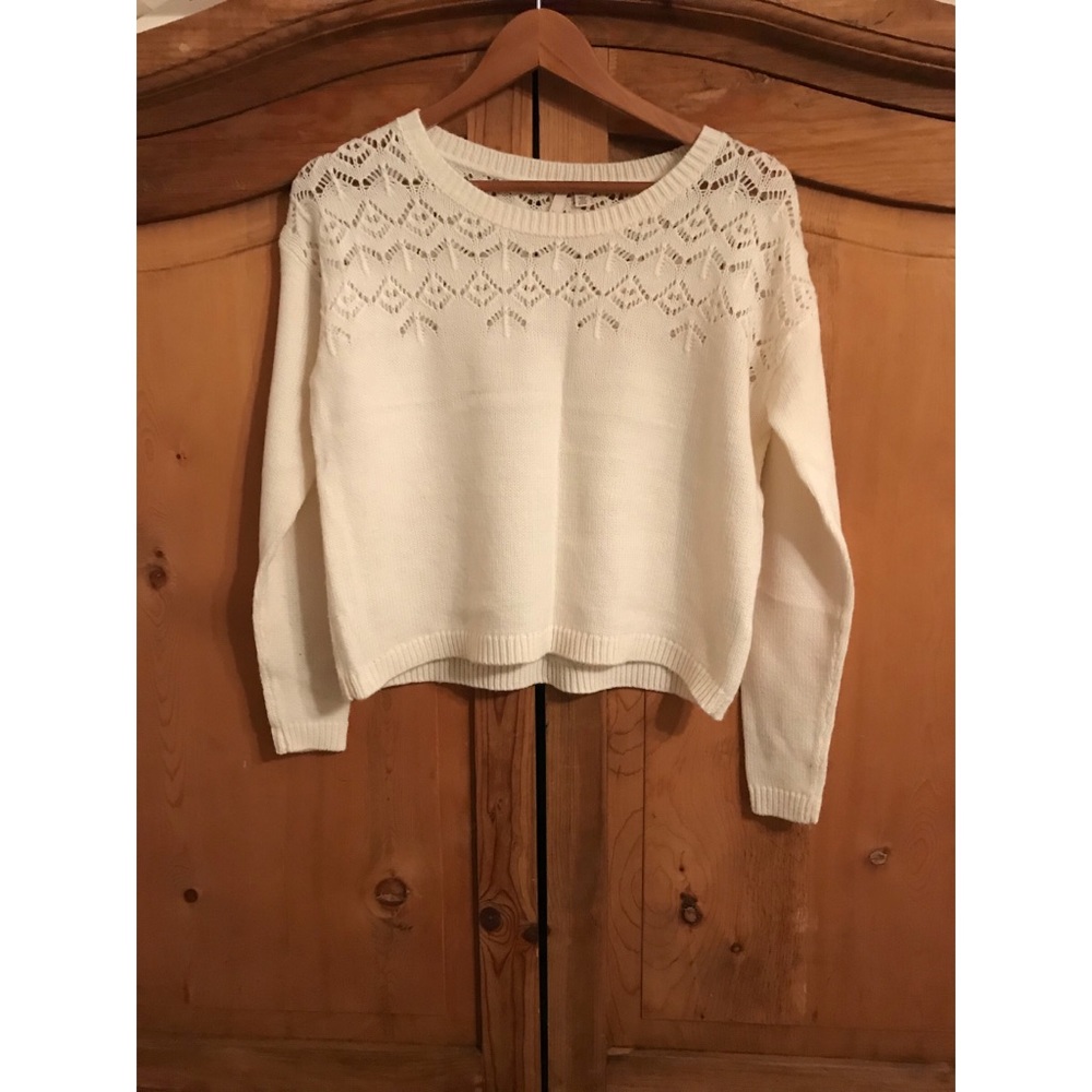 Sweater with detail around neck
